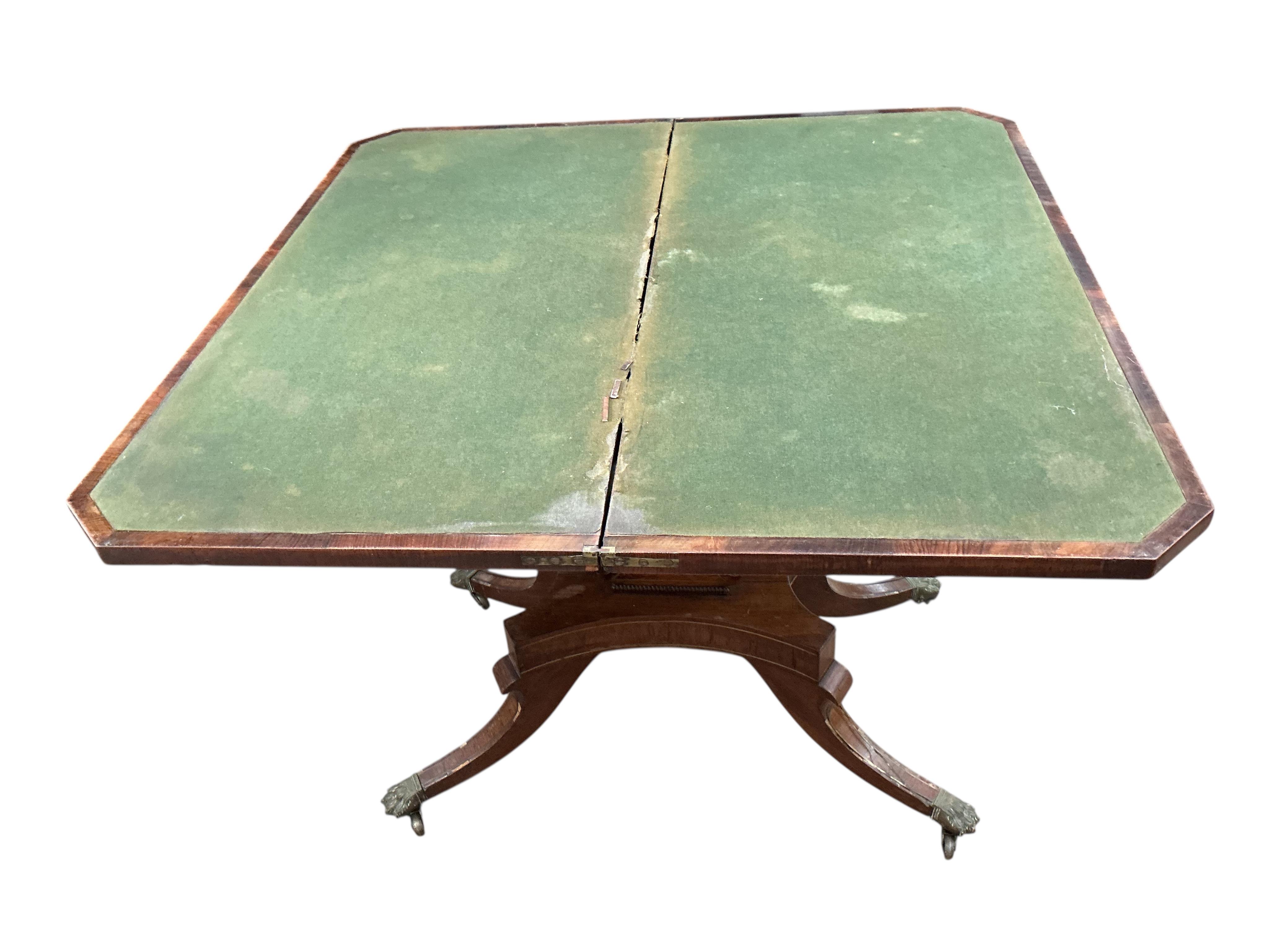 A Regency brass mounted rosewood folding card table, width 89cm, depth 44cm, height 74cm